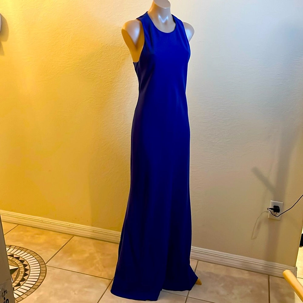Blue sleeveless backless fitted flare bottom gown. Size 6